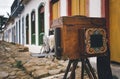 Old camera on a corner in the historic city of Paraty, Brazil. Royalty Free Stock Photo